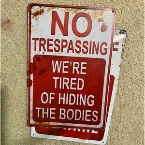 Wall signs. No trespassing, beware. Funny signs for room